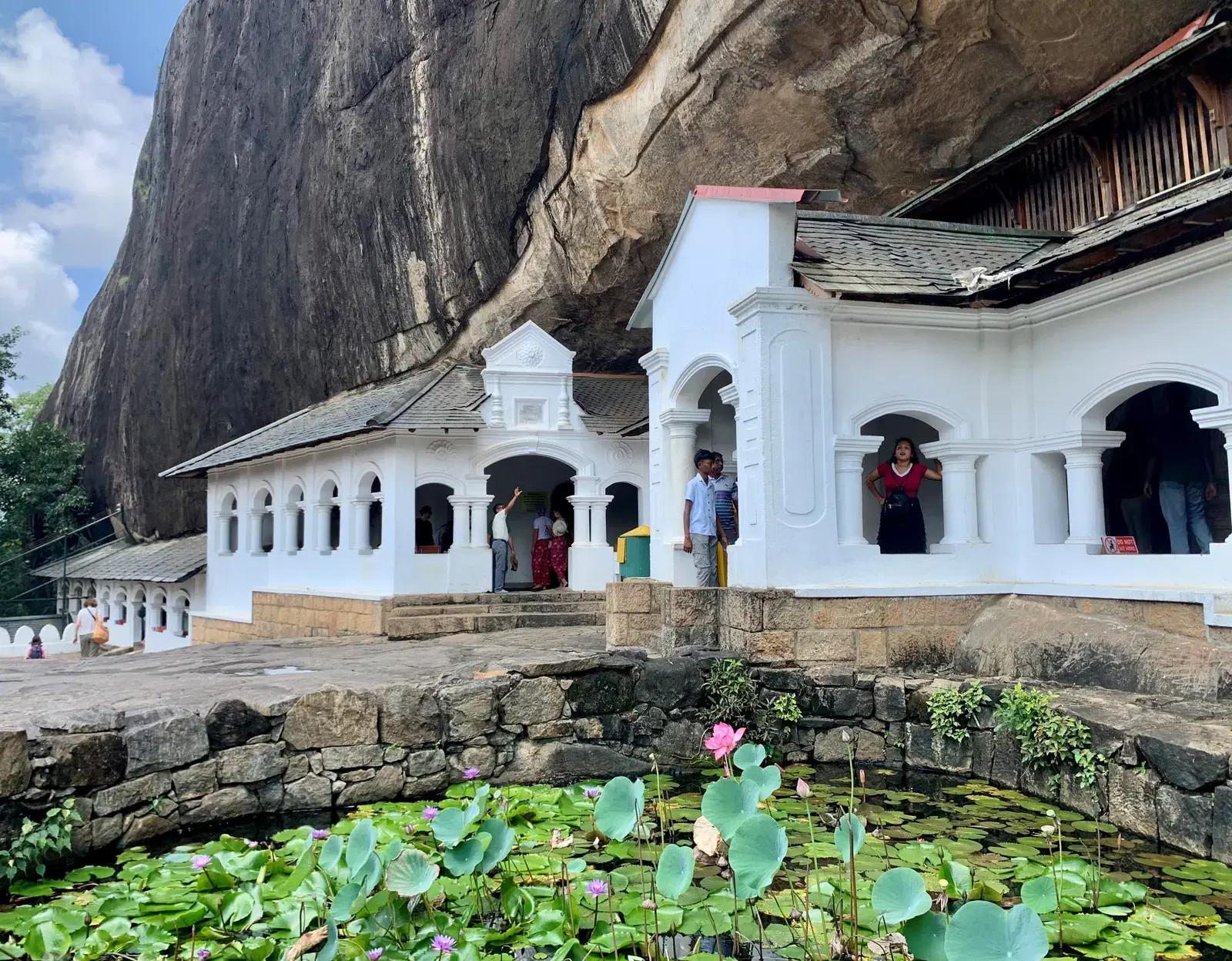 The exterior of the Dambulla Cave Temple complex, built into a granite outcrop