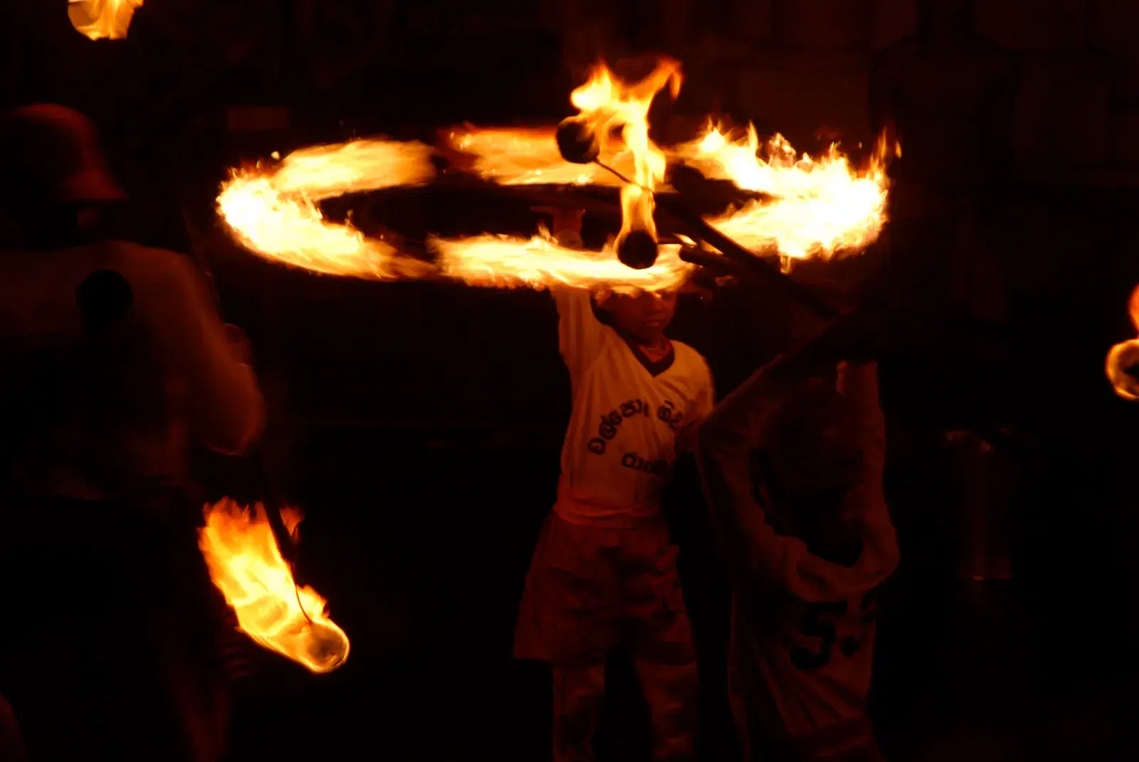 Fire dancing performance during the Kandy Esala Perahera