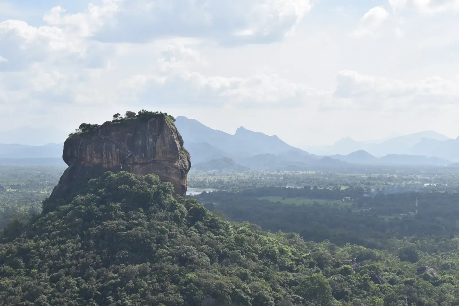 Wide view of Sigiriya Rock Fortress from the top of Pidurangala Rock