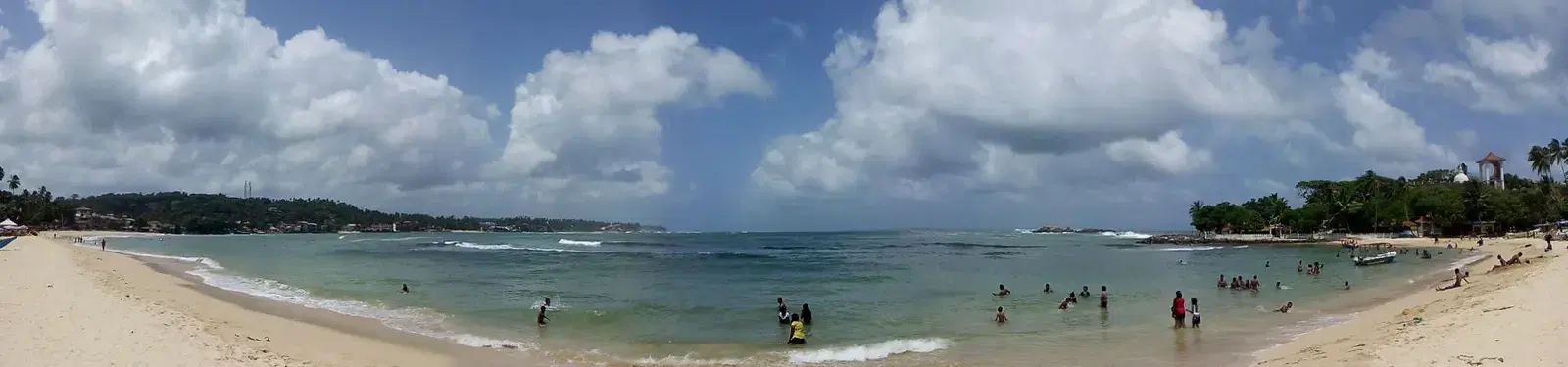 Panoramic view of Unawatuna's curved bay